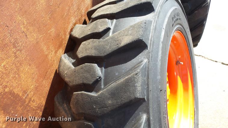 image for item EF9227 (4) 10-16.5 tires and wheels
