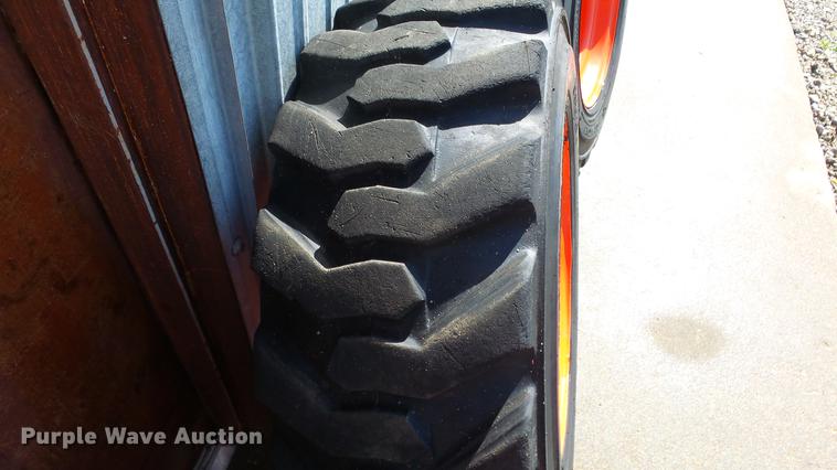 image for item EF9227 (4) 10-16.5 tires and wheels