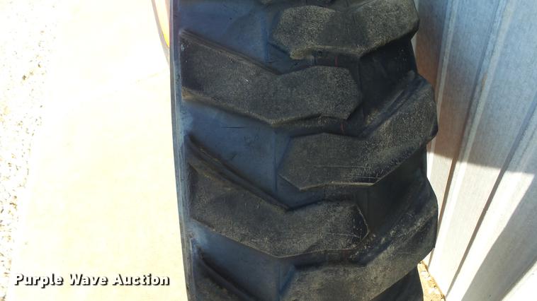 image for item EF9227 (4) 10-16.5 tires and wheels