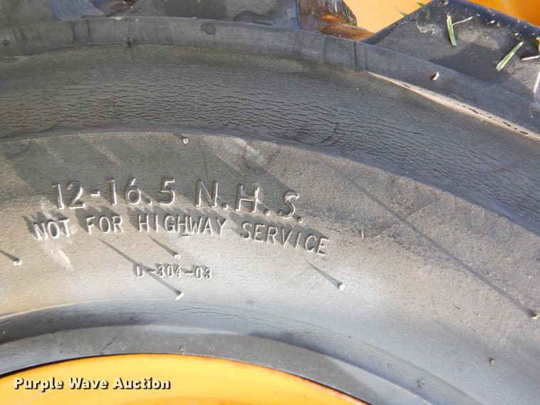 image for item EK9720 John Deere skid steer