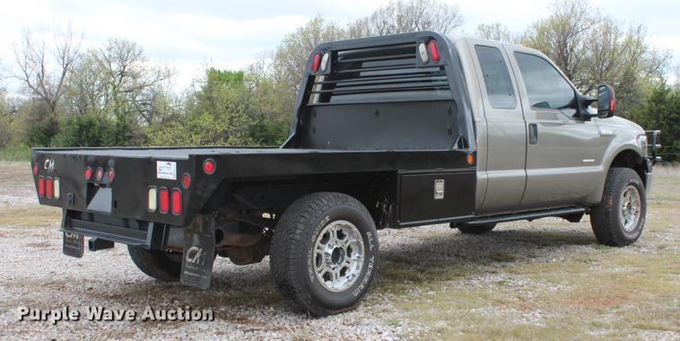 image for item DB5216 2007 Ford F350 Super Duty XLT SuperCab flatbed pickup truck