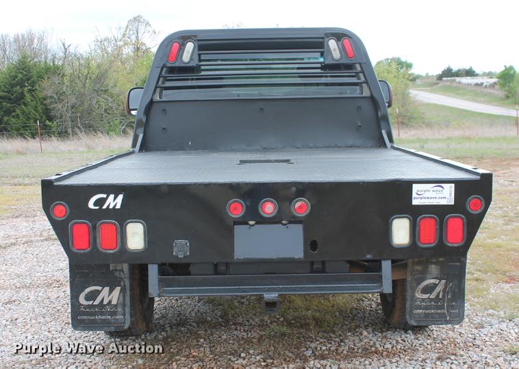 image for item DB5216 2007 Ford F350 Super Duty XLT SuperCab flatbed pickup truck