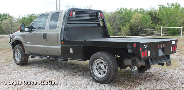 image for item DB5216 2007 Ford F350 Super Duty XLT SuperCab flatbed pickup truck