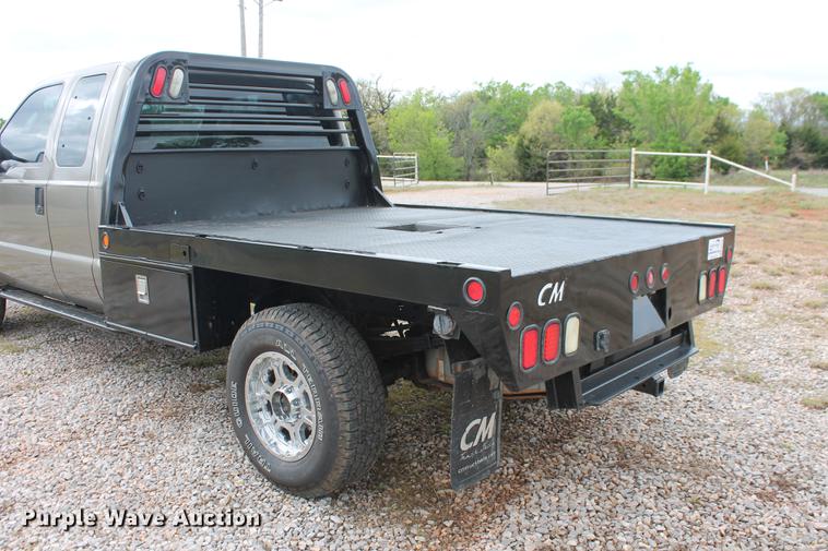 image for item DB5216 2007 Ford F350 Super Duty XLT SuperCab flatbed pickup truck
