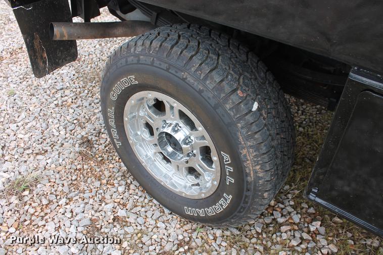 image for item DB5216 2007 Ford F350 Super Duty XLT SuperCab flatbed pickup truck