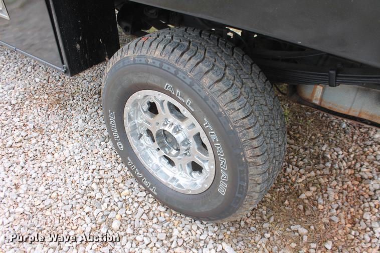 image for item DB5216 2007 Ford F350 Super Duty XLT SuperCab flatbed pickup truck