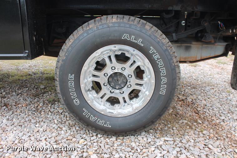 image for item DB5216 2007 Ford F350 Super Duty XLT SuperCab flatbed pickup truck