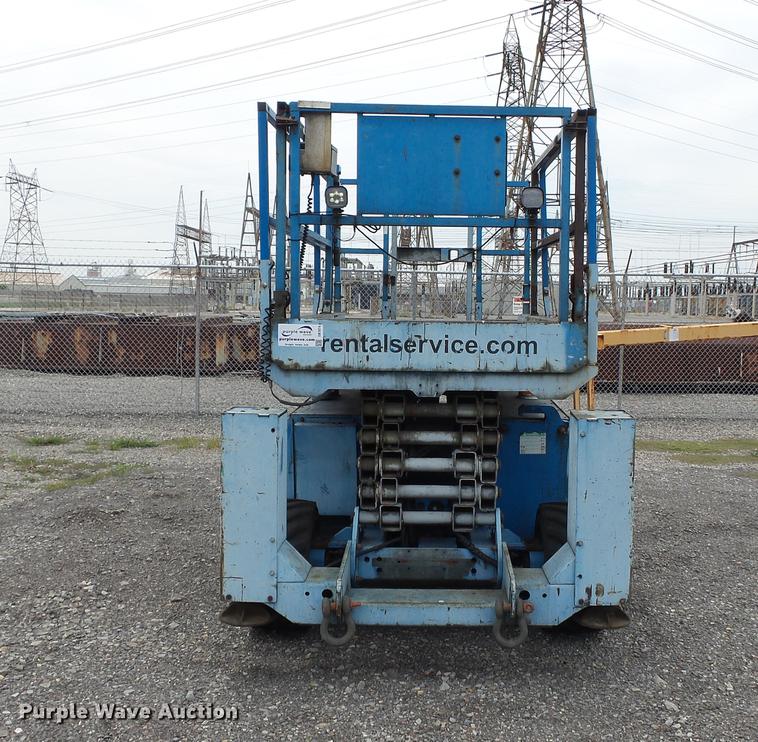 image for item DB7074 2003 Genie GS3268 RT scissor lift