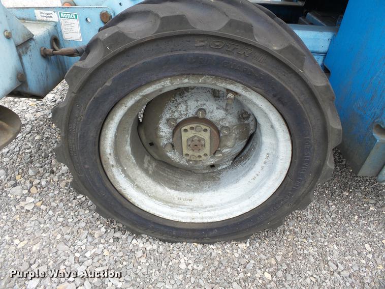 image for item DB7074 2003 Genie GS3268 RT scissor lift