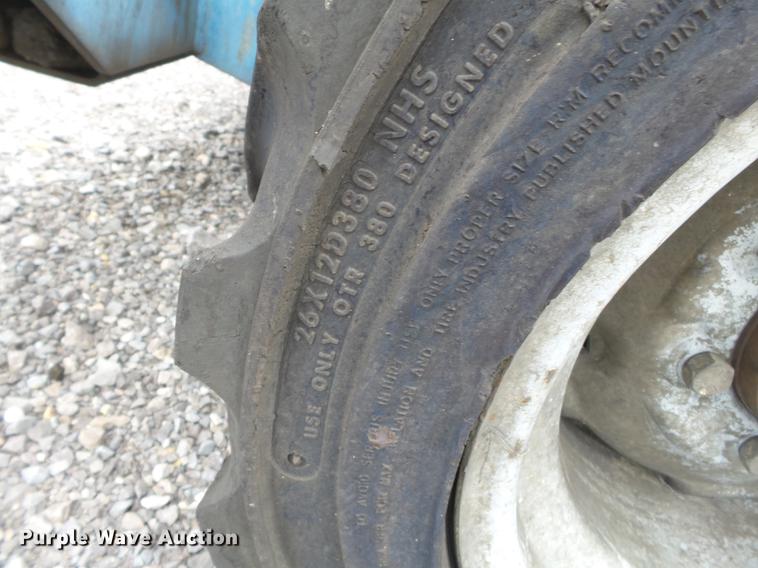 image for item DB7074 2003 Genie GS3268 RT scissor lift