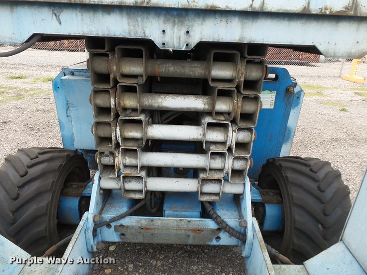 image for item DB7074 2003 Genie GS3268 RT scissor lift