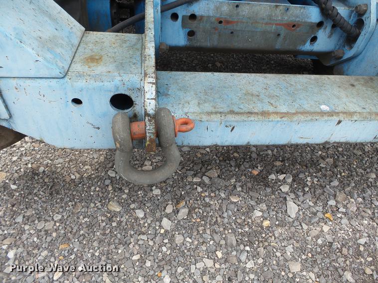 image for item DB7074 2003 Genie GS3268 RT scissor lift