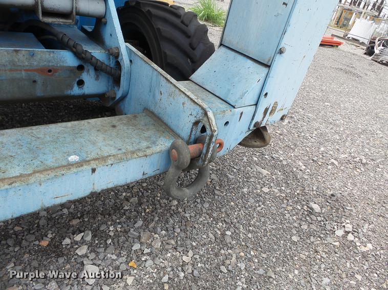 image for item DB7074 2003 Genie GS3268 RT scissor lift