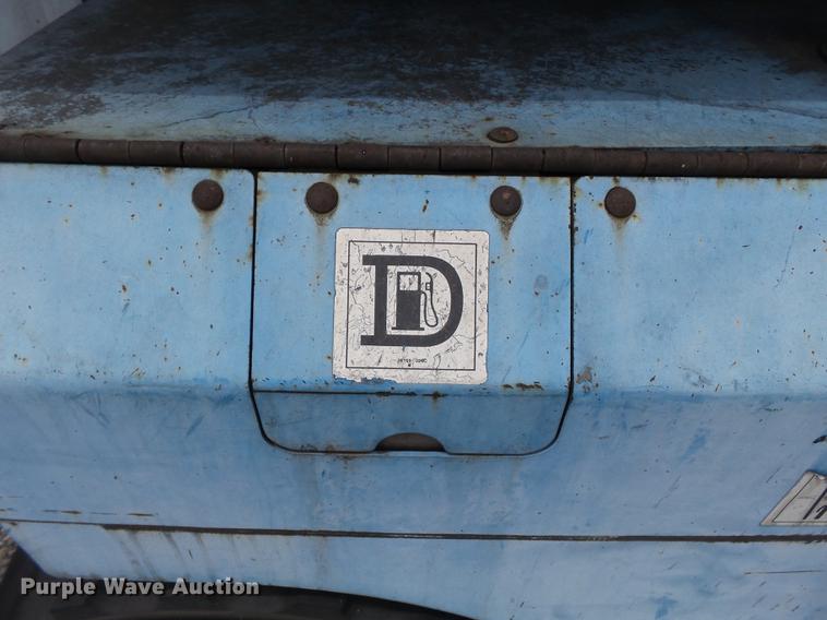 image for item DB7074 2003 Genie GS3268 RT scissor lift