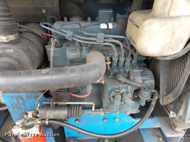 image for item DB7074 2003 Genie GS3268 RT scissor lift