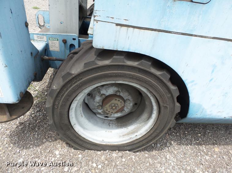 image for item DB7074 2003 Genie GS3268 RT scissor lift