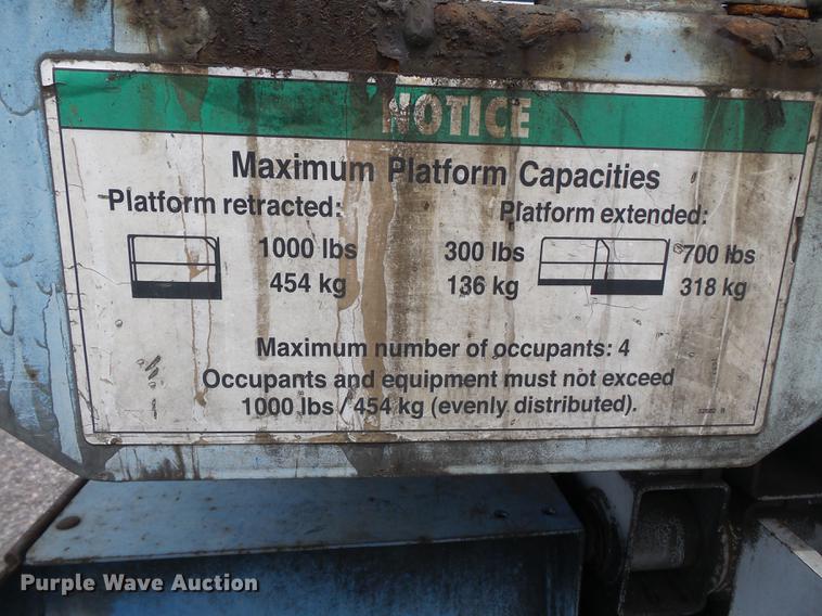 image for item DB7074 2003 Genie GS3268 RT scissor lift