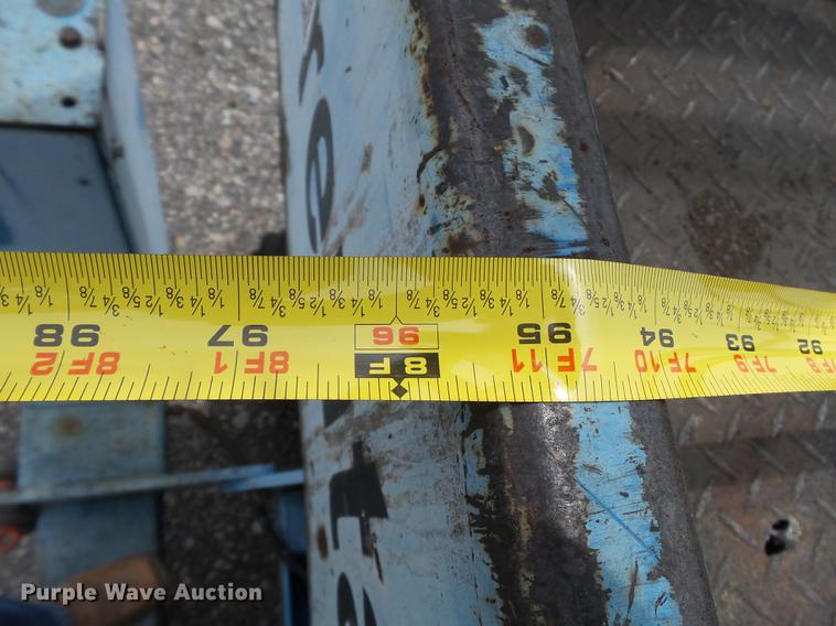 image for item DB7074 2003 Genie GS3268 RT scissor lift