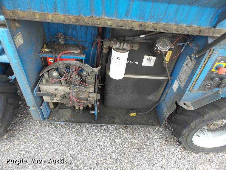 image for item DB7074 2003 Genie GS3268 RT scissor lift