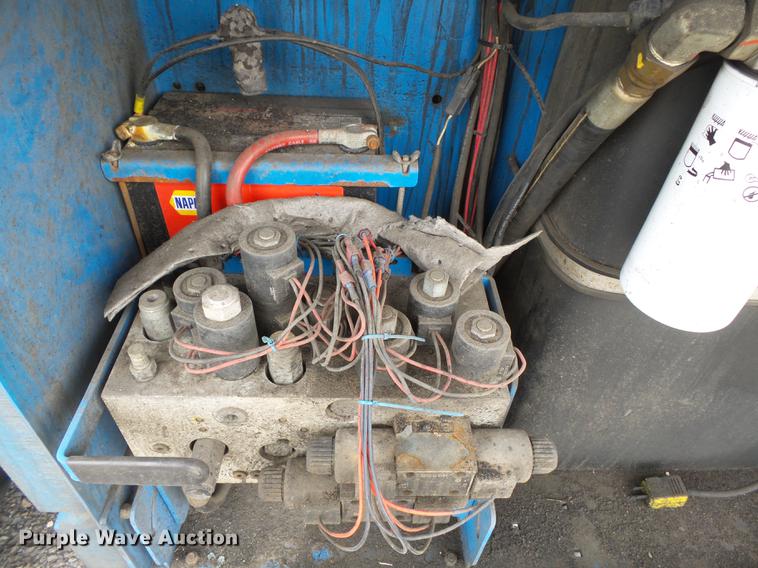 image for item DB7074 2003 Genie GS3268 RT scissor lift