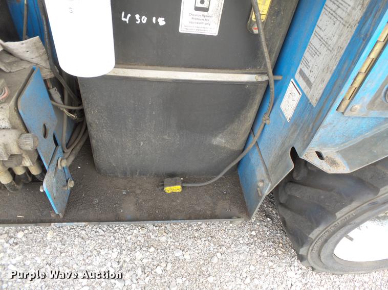 image for item DB7074 2003 Genie GS3268 RT scissor lift