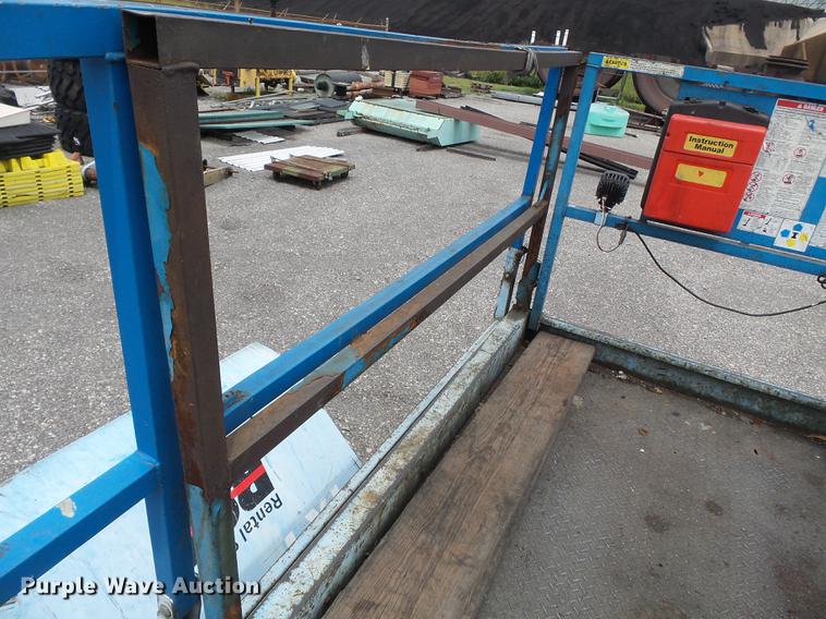 image for item DB7074 2003 Genie GS3268 RT scissor lift