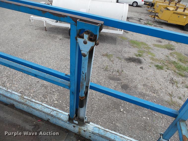 image for item DB7074 2003 Genie GS3268 RT scissor lift