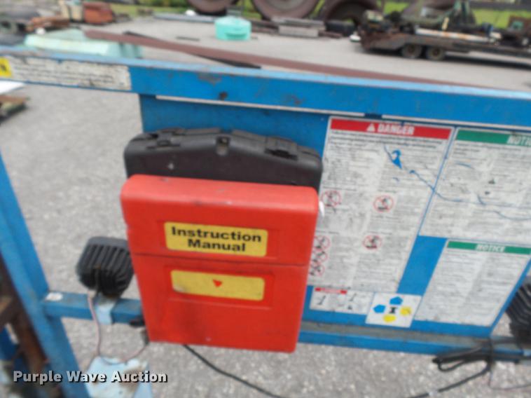 image for item DB7074 2003 Genie GS3268 RT scissor lift