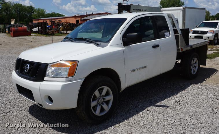 image for item DD7847 2011 Nissan Titan King Cab flatbed pickup truck