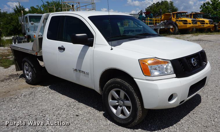 image for item DD7847 2011 Nissan Titan King Cab flatbed pickup truck
