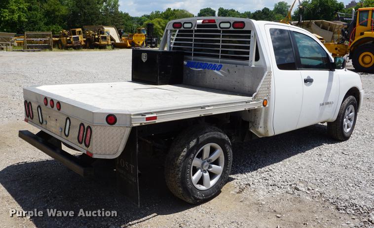 image for item DD7847 2011 Nissan Titan King Cab flatbed pickup truck