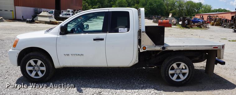 image for item DD7847 2011 Nissan Titan King Cab flatbed pickup truck