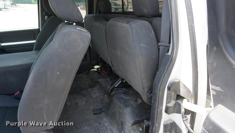 image for item DD7847 2011 Nissan Titan King Cab flatbed pickup truck