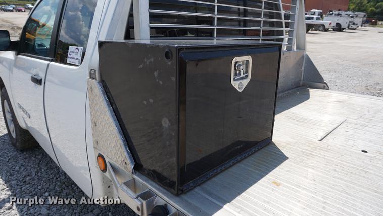 image for item DD7847 2011 Nissan Titan King Cab flatbed pickup truck