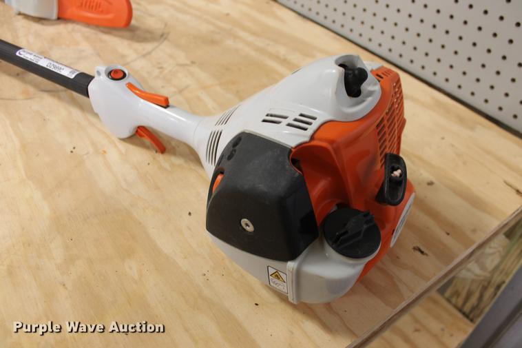 image for item DZ9890 Stihl HT86C pole saw with hedge clipper and edge trimmer attachments