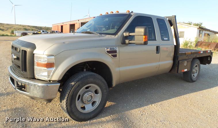 image for item EI9637 2008 Ford F350 Super Duty SuperCab bale bed pickup truck
