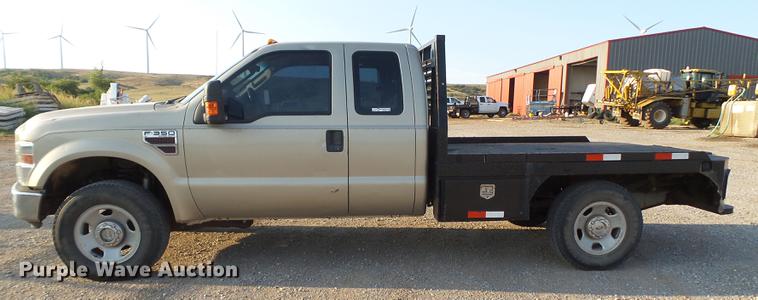 image for item EI9637 2008 Ford F350 Super Duty SuperCab bale bed pickup truck