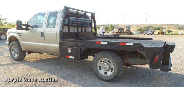 image for item EI9637 2008 Ford F350 Super Duty SuperCab bale bed pickup truck