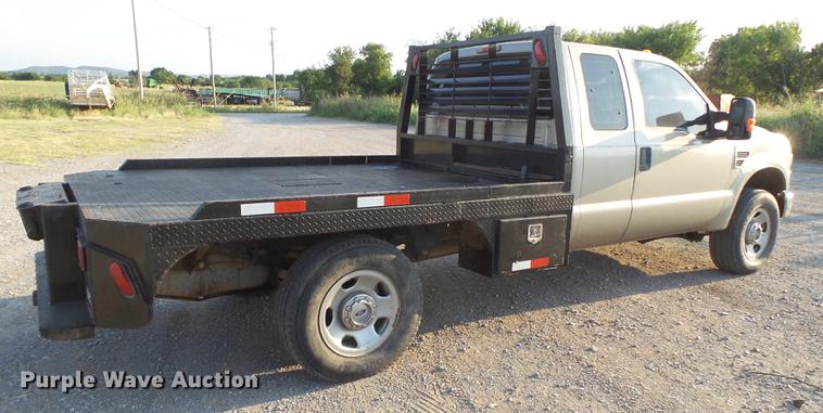 image for item EI9637 2008 Ford F350 Super Duty SuperCab bale bed pickup truck