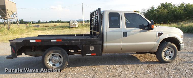 image for item EI9637 2008 Ford F350 Super Duty SuperCab bale bed pickup truck