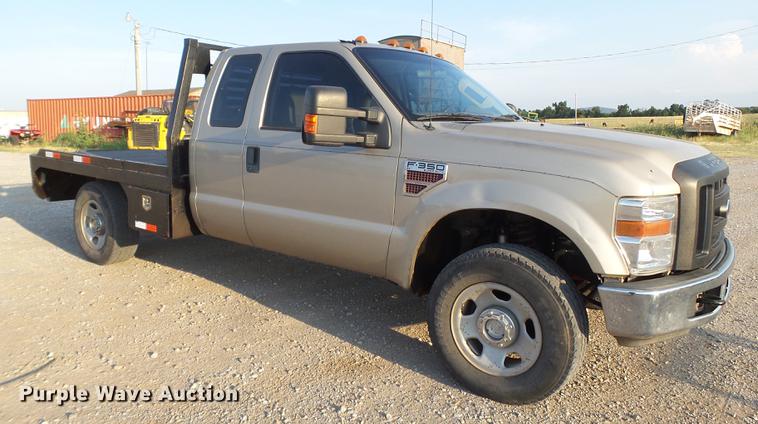 image for item EI9637 2008 Ford F350 Super Duty SuperCab bale bed pickup truck