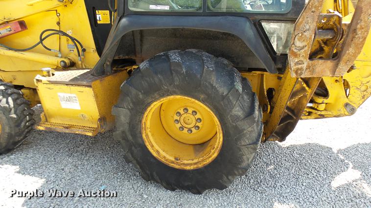 image for item DB9302 1997 John Deere 310E backhoe