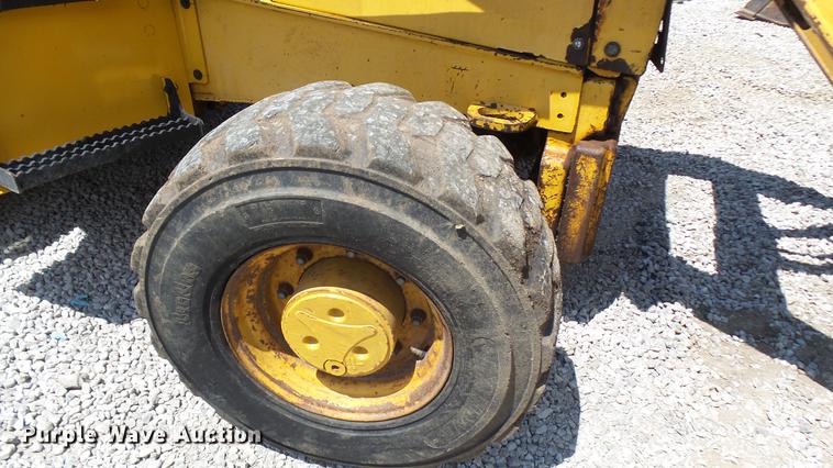 image for item DB9302 1997 John Deere 310E backhoe