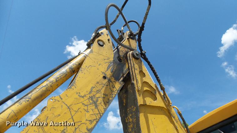 image for item DB9302 1997 John Deere 310E backhoe