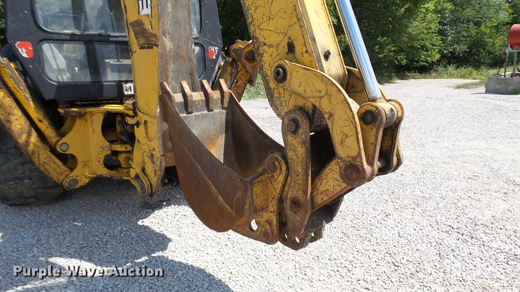 image for item DB9302 1997 John Deere 310E backhoe