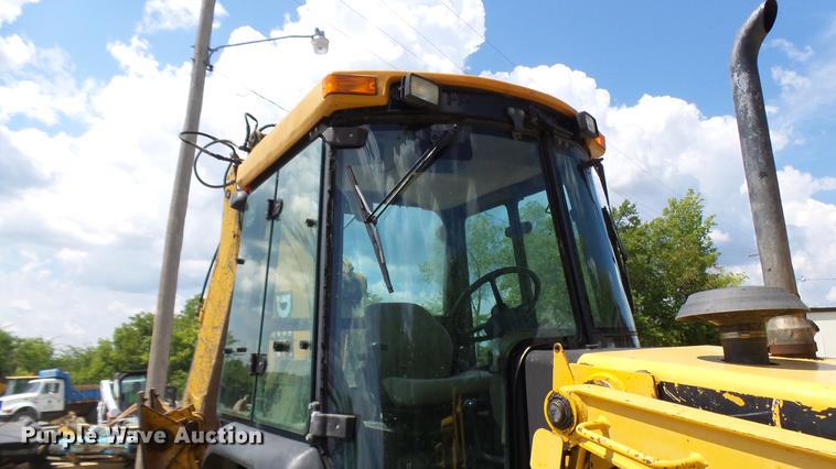 image for item DB9302 1997 John Deere 310E backhoe