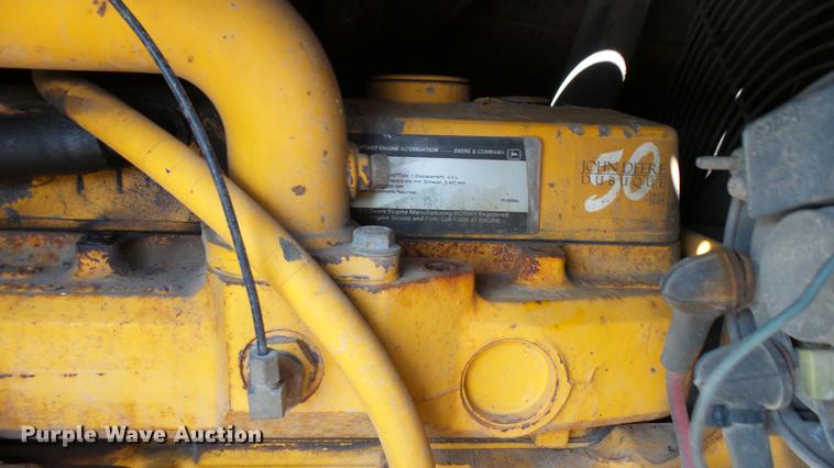 image for item DB9302 1997 John Deere 310E backhoe