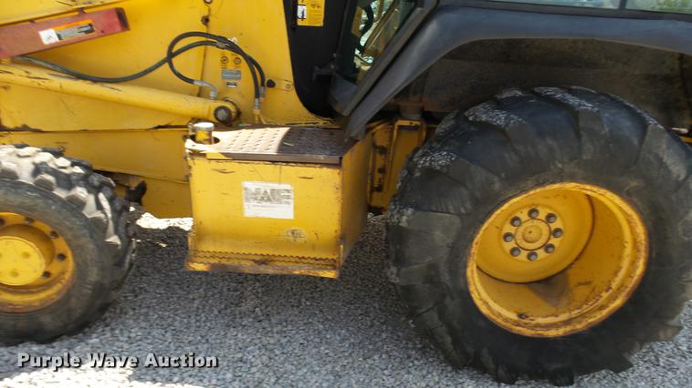 image for item DB9302 1997 John Deere 310E backhoe