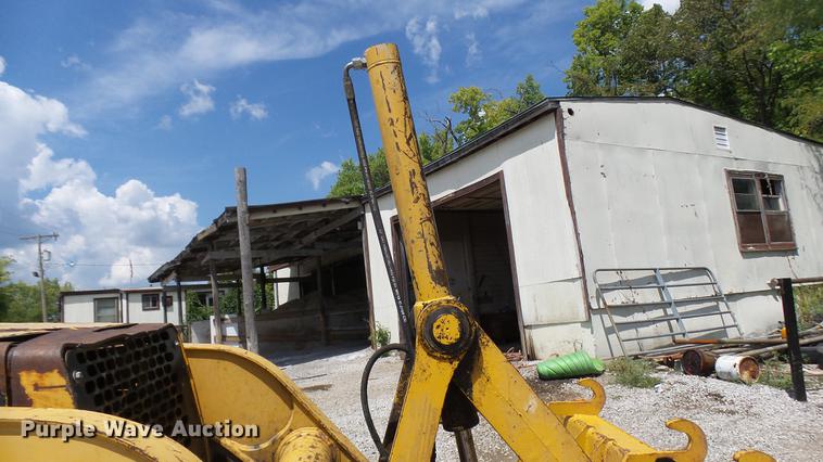 image for item DB9302 1997 John Deere 310E backhoe