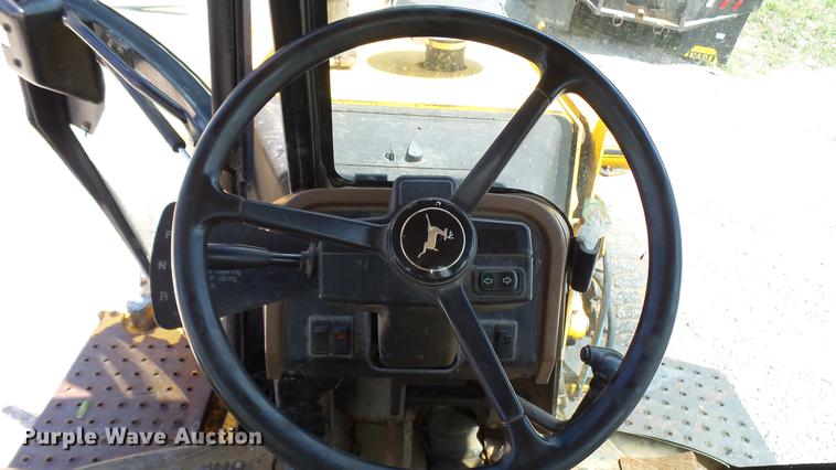 image for item DB9302 1997 John Deere 310E backhoe